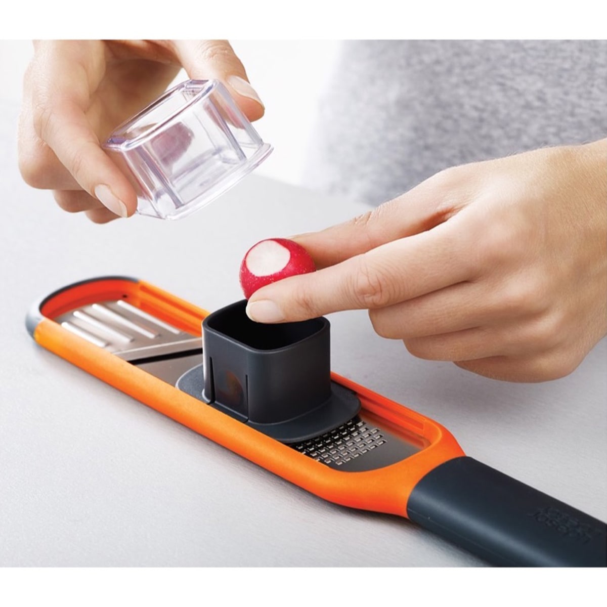 Joseph & Joseph Handi-Grate 2-in-1 Mini Grater & Slicer (5.7 x 28.5 x 4.3 cm, Orange)